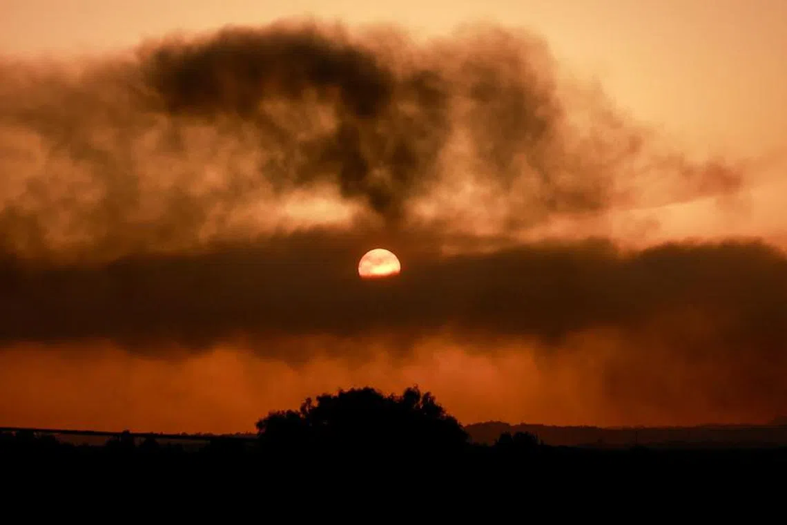 Smoke rises over northern Gaza Strip, amid the ongoing conflict between Israel and Palestinian Islamist group Hamas, as seen from Sderot in southern Israel, November 7, 2023. REUTERS/Ammar Awad/File Photo