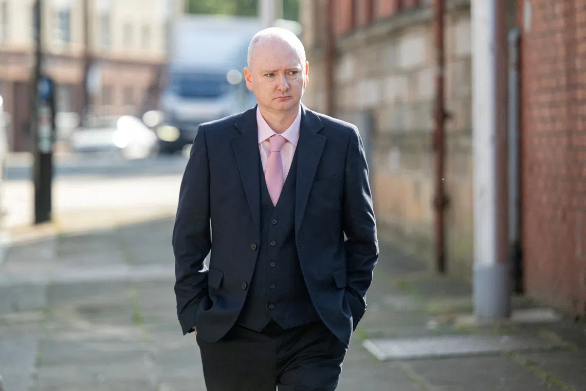 Former snooker world champion Graeme Dott, who is accused of sexually abusing two children between 1993 and 2010, arrives at the High Court in Glasgow, Scotland, Britain, August 24, 2026. REUTERS/Lesley Martin