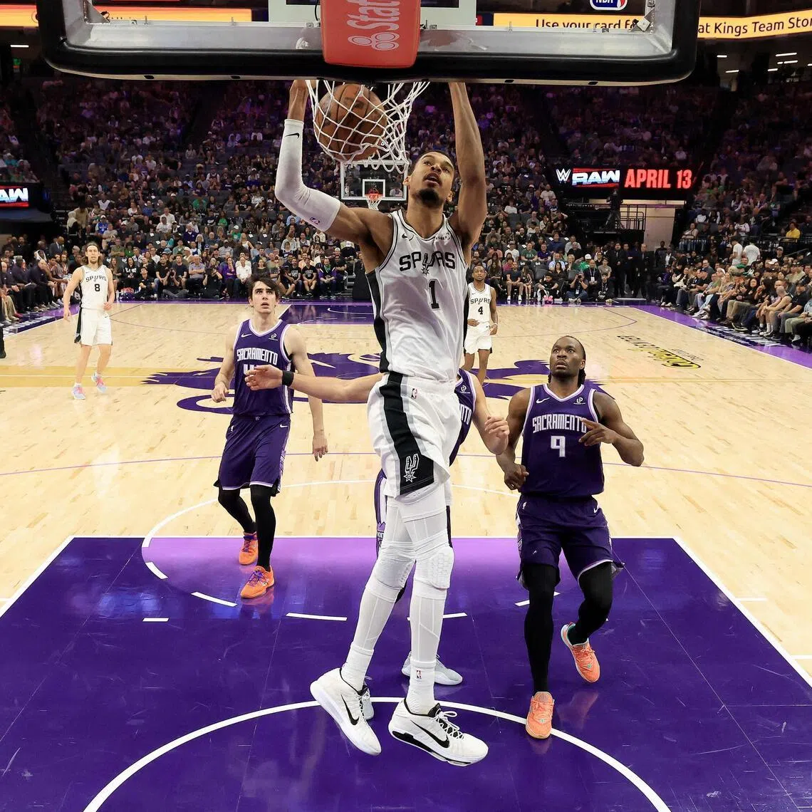 Victor Wembanyama of the San Antonio Spurs dunks the ball against the Sacramento Kings in the first half at Golden 1 Center.