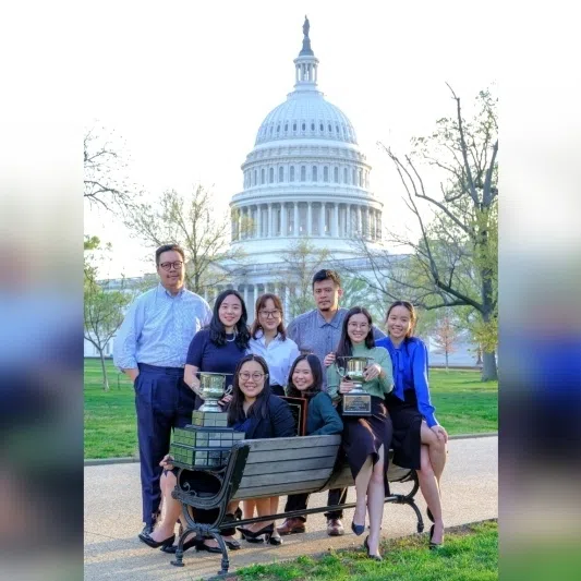 The winning team from the Singapore Management University with the trophy in Washington DC. 