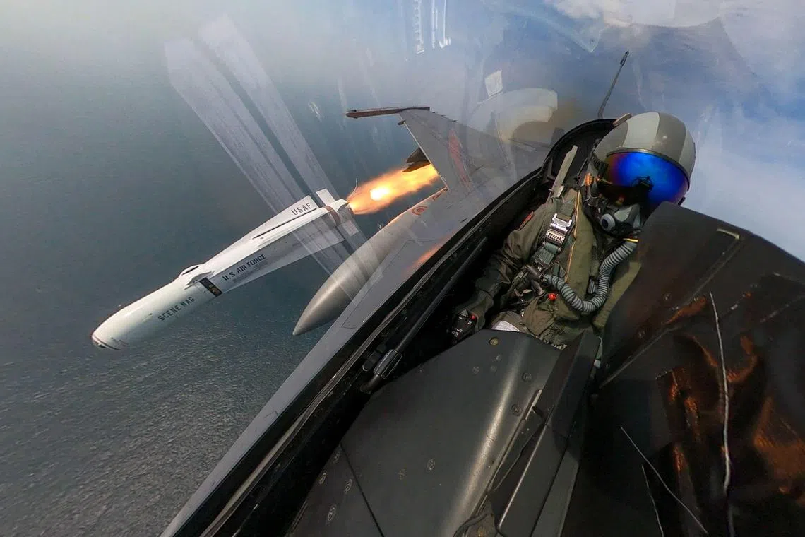 A Taiwanese F-16 pilot fires a missile during an exercise at the Penghu islands.