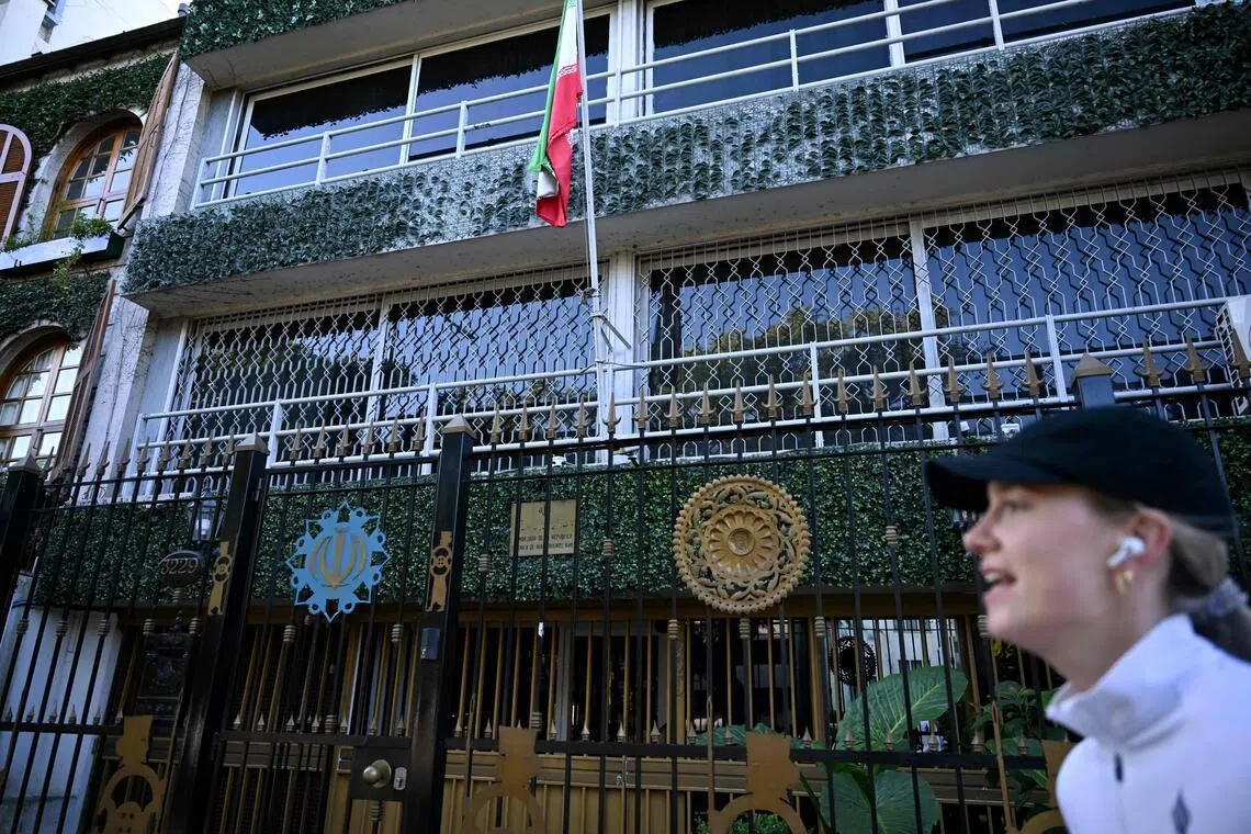 A woman walks past the Iranian embassy in Argentina's capital, Buenos Aires. 