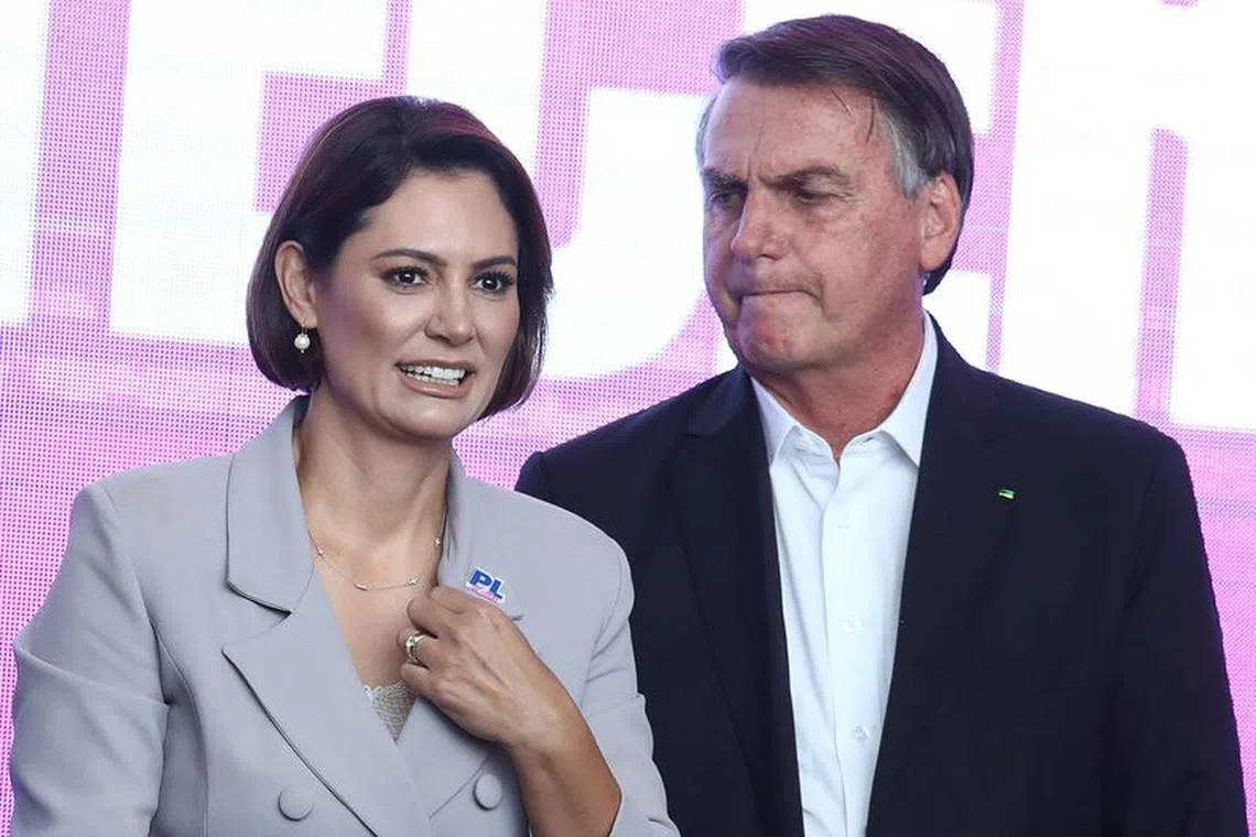 FILE PHOTO: Brazil's former President Jair Bolsonaro and his wife, Michelle Bolsonaro, attend a Partido Liberal Mulher event at the Legislative Assembly of the state of Sao Paulo, in Sao Paulo, Brazil, May 6, 2023. REUTERS/Carla Carniel