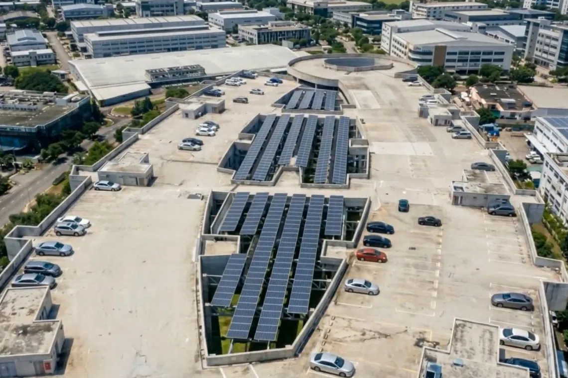 AI-generated rendering of solar panels hanging across industrial buildings at 15 Woodlands Loop.