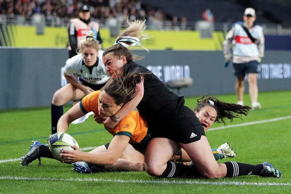 FILE PHOTO: Rugby Union - Women’s World Cup - Pool A - Australia v New Zealand - Eden Park, Auckland, New Zealand - October 8, 2022 Australia's Bienne Terita scores their first try REUTERS/David Rowland/File Photo