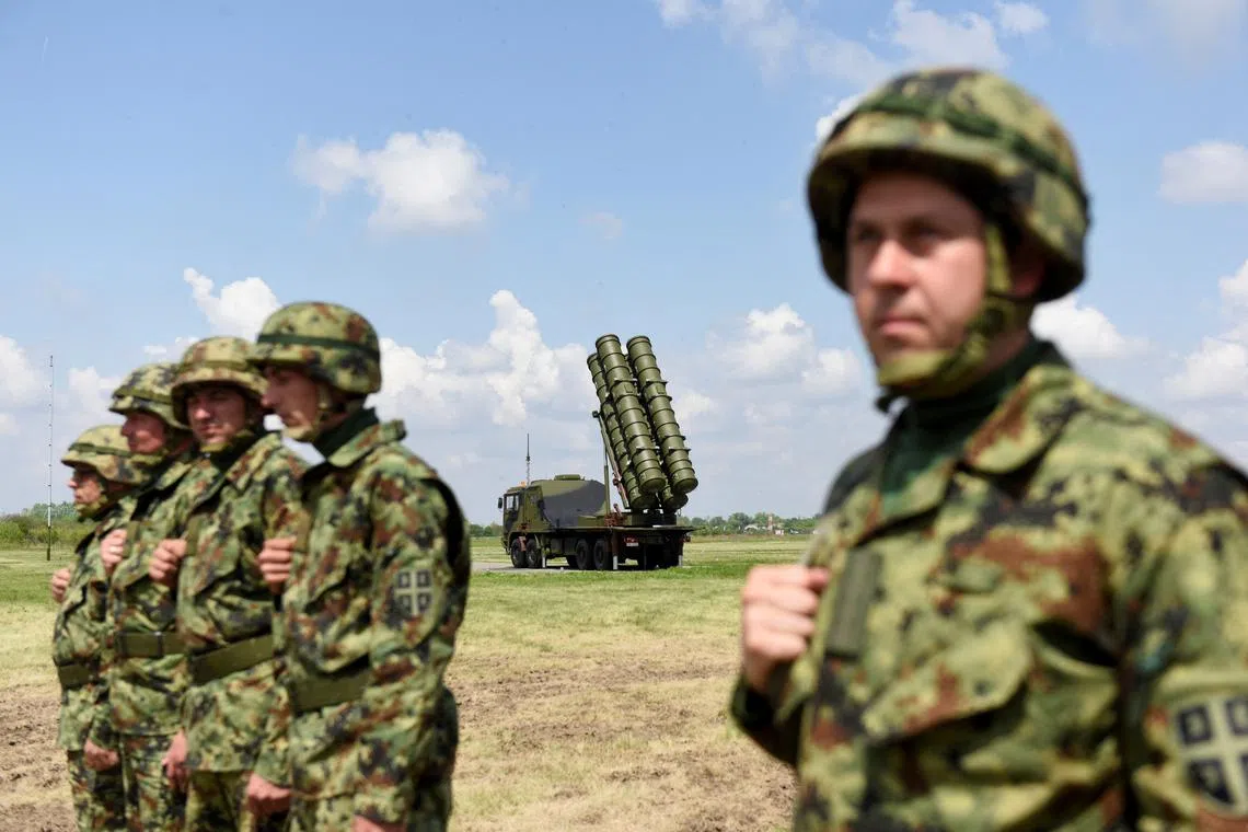 Serbian Army soldiers stand near the Chinese medium-range missile system FK-3, the latest weapon received by the Serbian Army, in Batajnica, near Belgrade, Serbia, April 30, 2022. REUTERS/Zorana Jevtic/File Photo