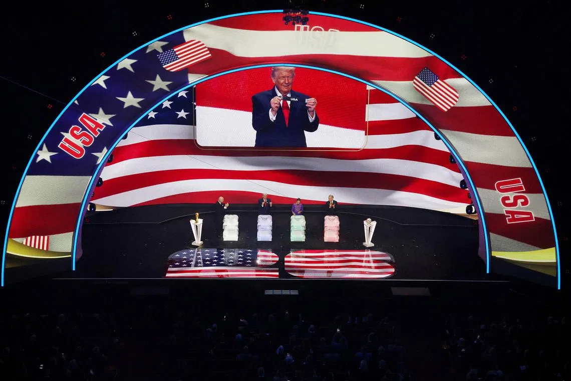 U.S. President Donald Trump draws USA during the FIFA World Cup 2026 draw REUTERS/Carlos Barria