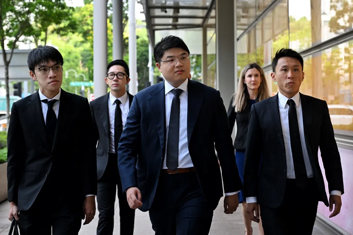 The judge found that Bloomberg’s real estate reporter Low De Wei (centre) knew certain information used in his article was false, or had published without caring whether it was true.