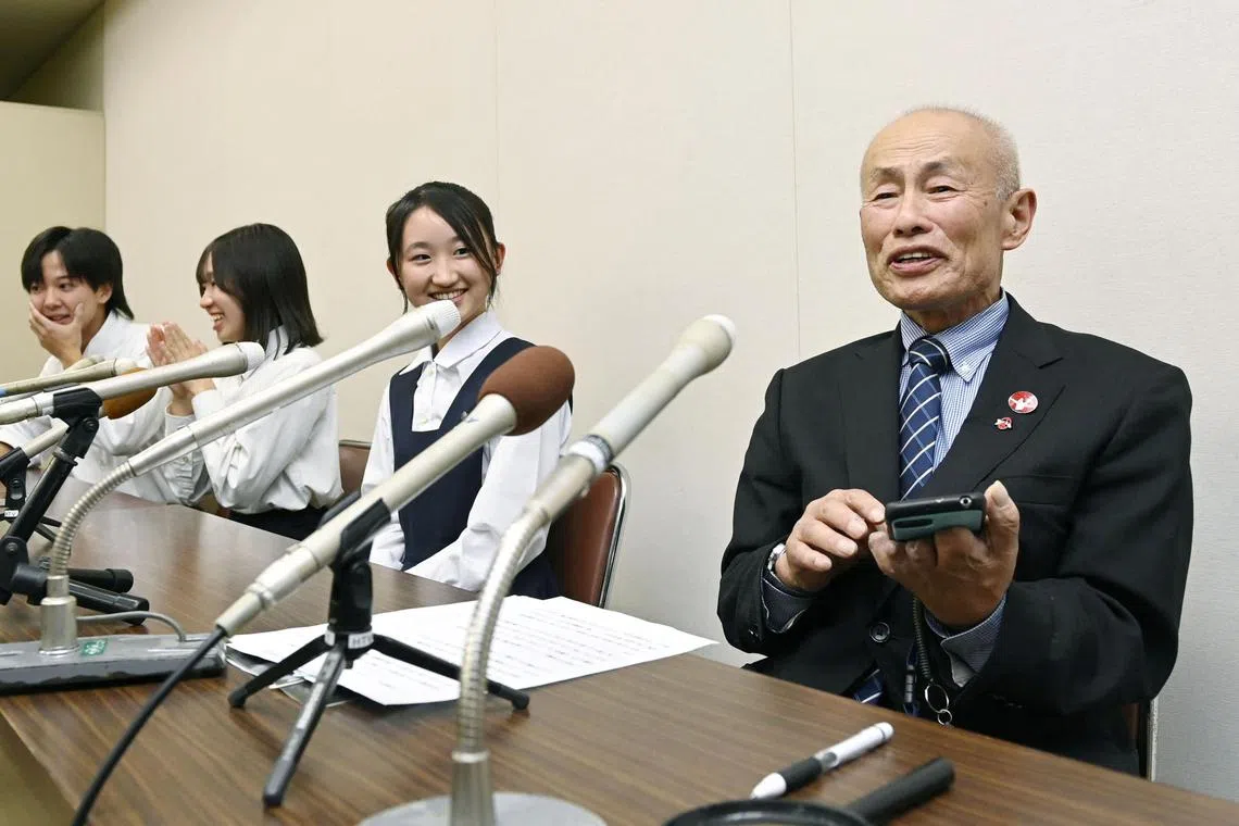 Japan Confederation of A- and H-Bomb Sufferers Organizations (Nihon Hidankyo) co-chair Toshiyuki Mimaki, who survived the 1945 atomic bombing of Hiroshima, attends a news conference after the 2024 Nobel Peace Prize winner was announced in Hiroshima, Japan October 11, 2024, in this photo taken by Kyodo.   Mandatory credit Kyodo/via REUTERS