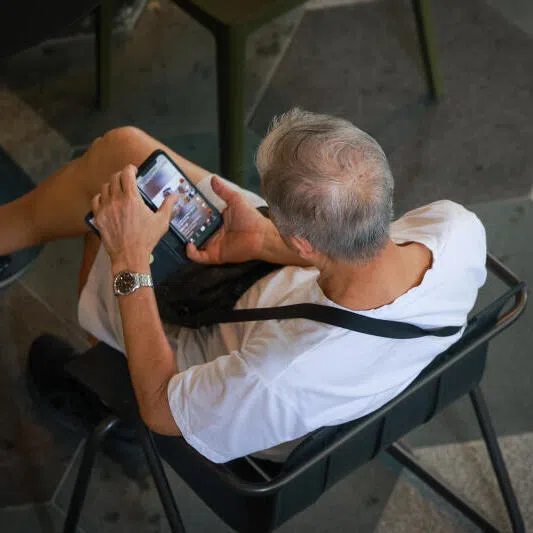 Sometimes older people scroll simply because they are bored, says the writer.