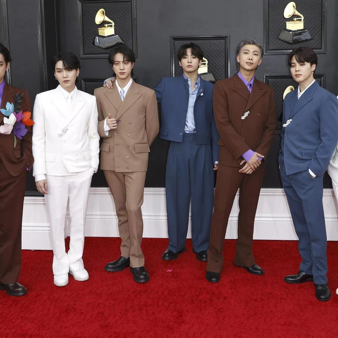 V, Suga, Jin, Jungkook, RM, Jimin and J-Hope of BTS arrive for the 64th annual Grammy Awards at the MGM Grand Garden Arena in Las Vegas, Nevada, USA, April 3, 2022.