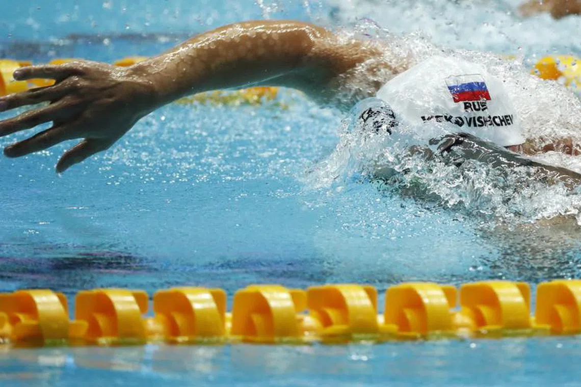 Swimming - 18th FINA World Swimming Championships - Men's 4x200m Freestyle Final - Nambu University Municipal Aquatics Center, Gwangju, South Korea - July 26, 2019. Team Russia competes. REUTERS/Kim Hong-Ji/File Photo