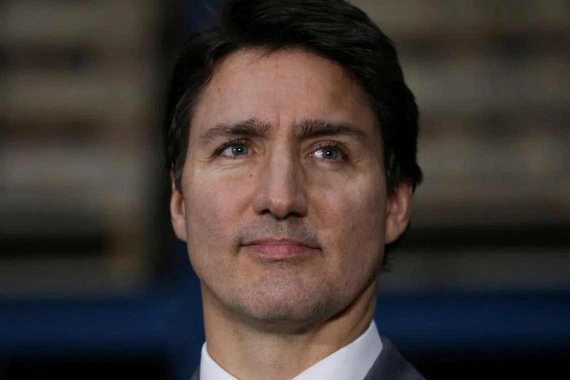 FILE PHOTO: Canada's Prime Minister Justin Trudeau looks on as he visits the site of lithium-ion cell and battery manufacturer E-One Moli Energy (Canada) in Maple Ridge, British Columbia, Canada, November 14, 2023.  REUTERS/Chris Helgren/File Photo