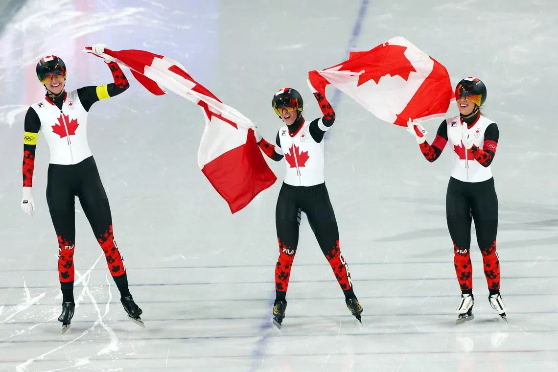 Milano Cortina 2026 Olympics - Speed Skating - Women's Team Pursuit Final A - Netherlands vs Canada - Milano Speed Skating Stadium, Milan, Italy - February 17, 2026. Isabelle Weidemann of Canada, Valerie Maltais of Canada and Ivanie Blondin of Canada celebrate winning gold the Women's Team Pursuit Final A against Netherlands REUTERS/Yves Herman
