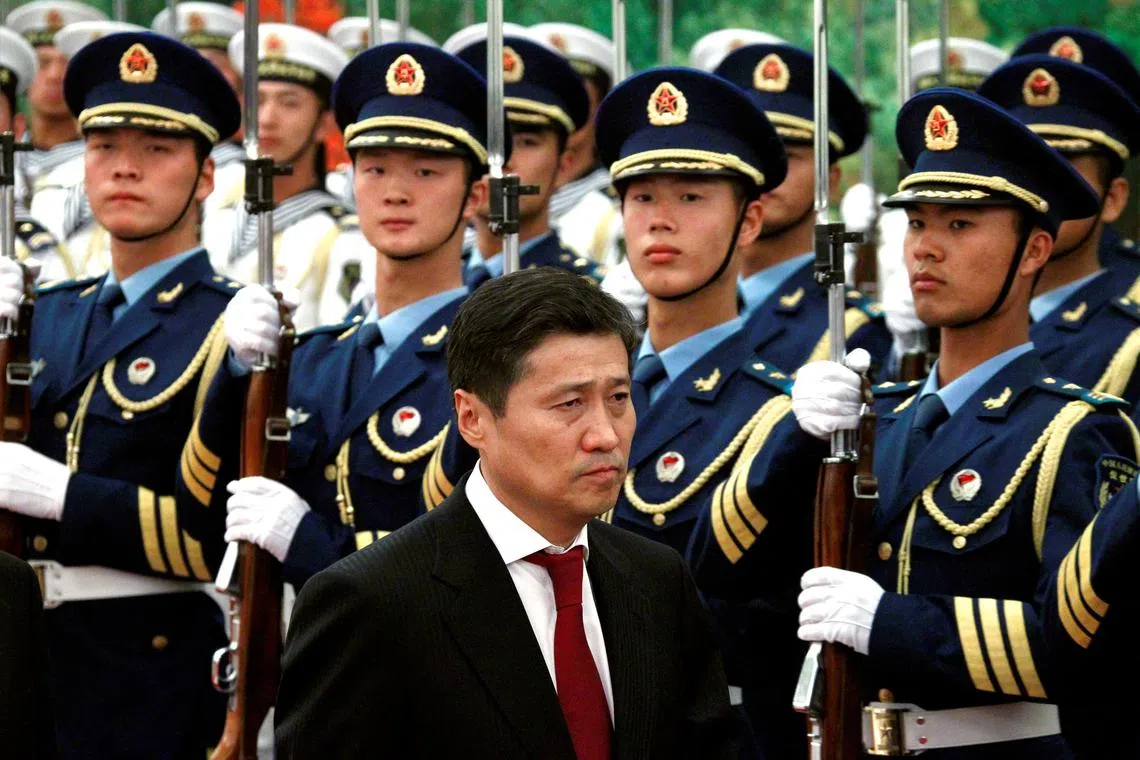 FILE PHOTO: Mongolian Prime Minister Sukhbaatar Batbold inspects an honour guard during an official welcoming ceremony in the Great Hall of the People in Beijing June 16, 2011. Batbold is on a three-day official visit to China. REUTERS/David Gray/File Photo