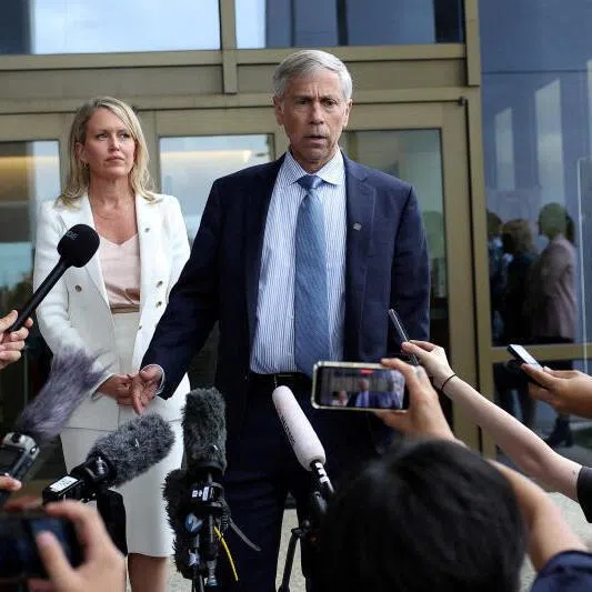 High-profile lawyer Barry Pollack (right) speaking to the media outside a US district court in Saipan, Northern Mariana Islands, US, on June 26, 2024.