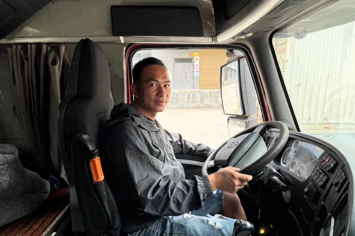Su Wenpeng drives freight trucks for logistics company Chefuwang, bringing goods from Pingxiang, China, to a depot in Vietnam across the border.