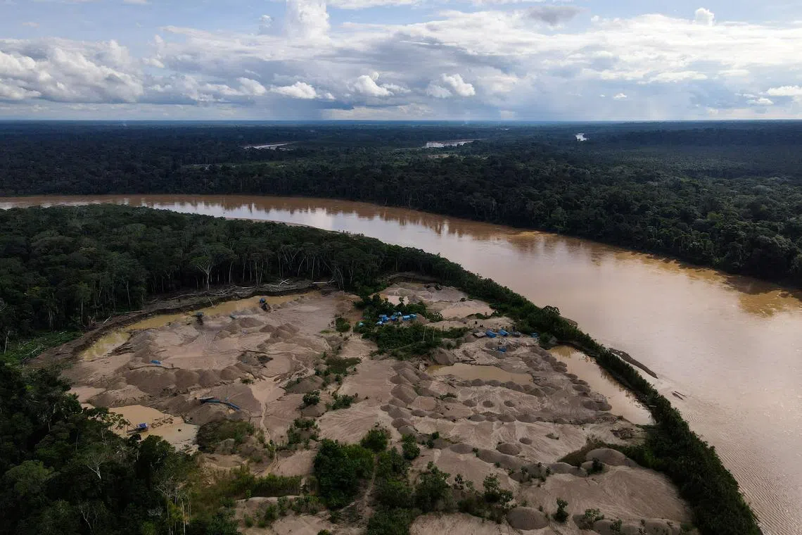 FILE PHOTO: A camp of informal gold miners is pictured in Los Amigos, in the Madre de Dios region, Peru May 22, 2023. REUTERS/Alessandro Cinque/File Photo