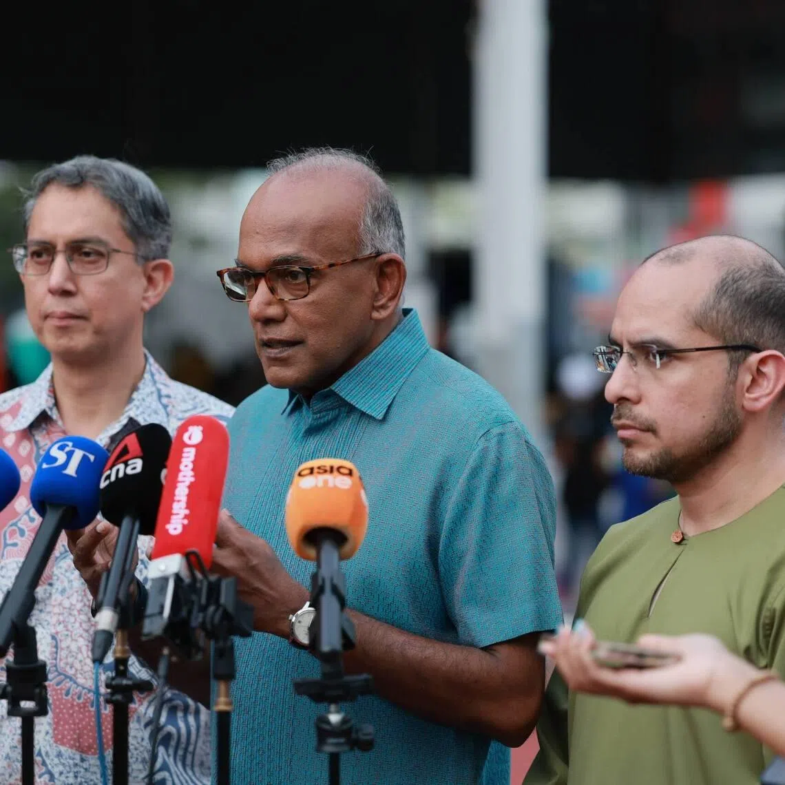Home Affairs Minister K. Shanmugam (centre) speaking to the media on March 8. With him are Acting Minister-in-charge of Muslim Affairs Muhammad Faishal Ibrahim (left) and Nee Soon GRC MP Syed Harun Alhabsyi.
