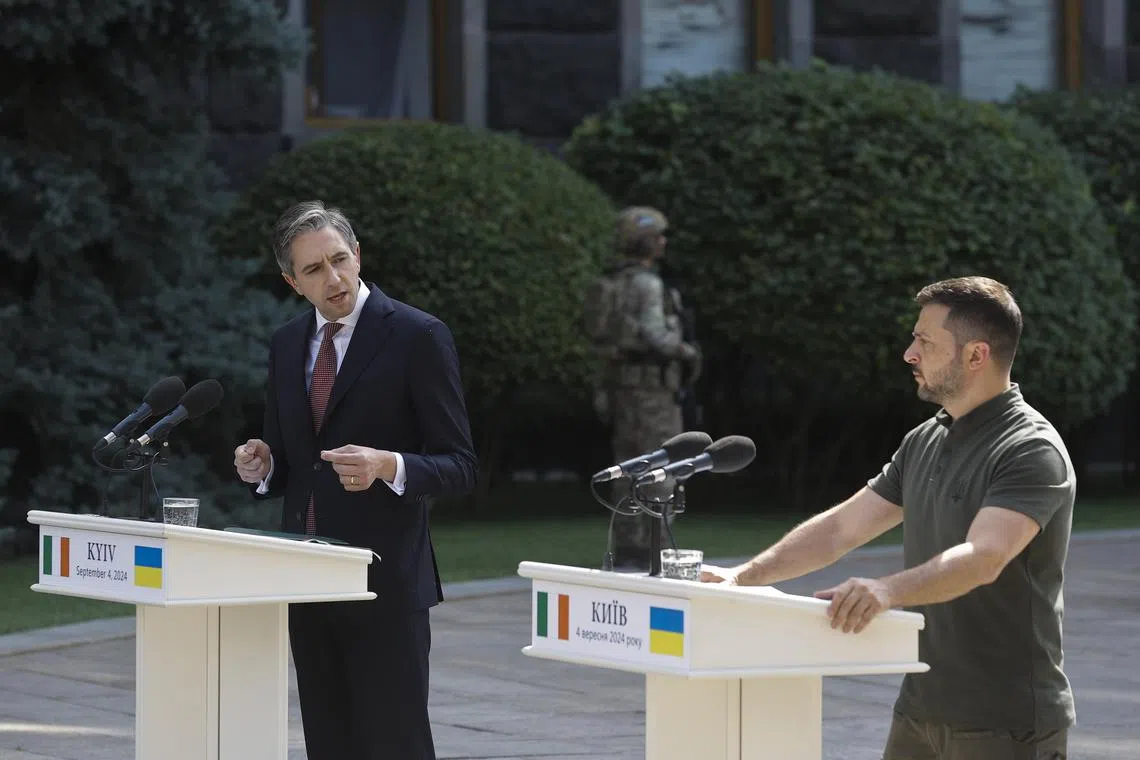 Ukrainian President Volodymyr Zelensky (right) and Ireland's Taoiseach Simon Harris delivering a joint press conference after their meeting in Kyiv, on Sept 4.