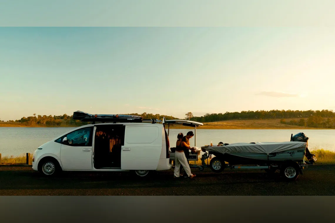 Diyanah Afendy and her partner Scott Tillman at Lake Wivenhoe in Queensland during their 10-month trip around Australia.