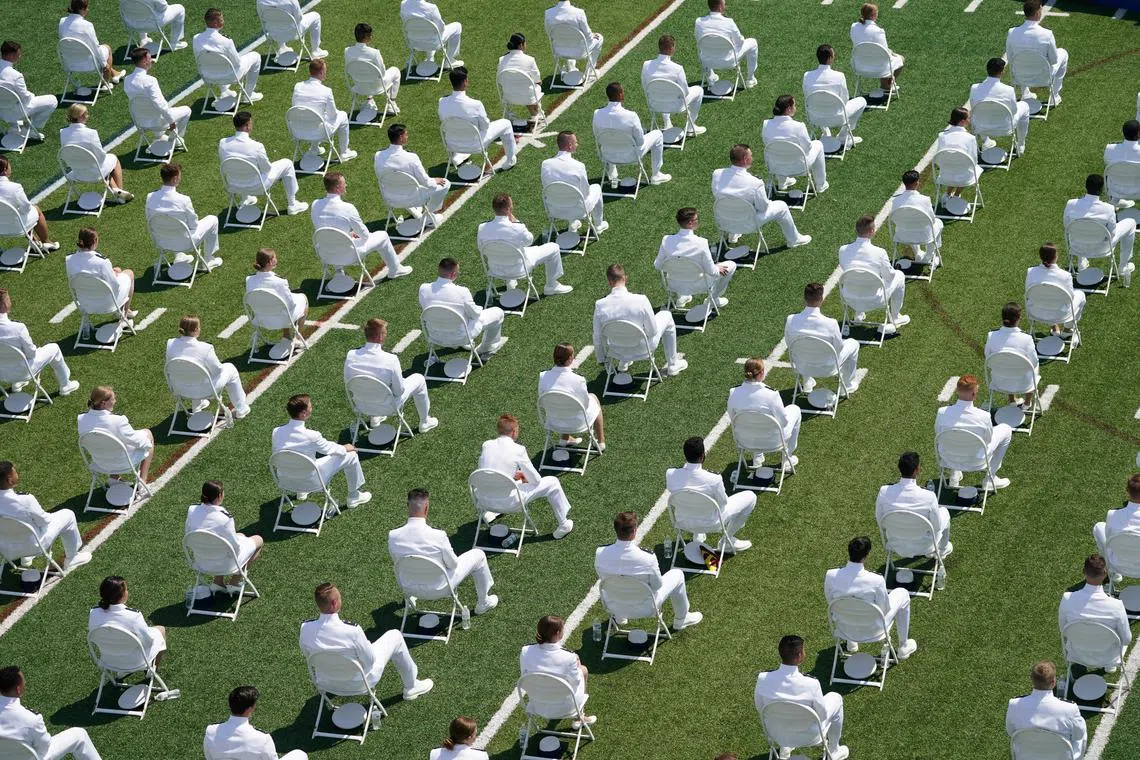 FILE PHOTO: Cadets attend the U.S. Coast Guard Academy commencement ceremony in New London, Connecticut, U.S., May 19, 2021. REUTERS/Kevin Lamarque/File Photo