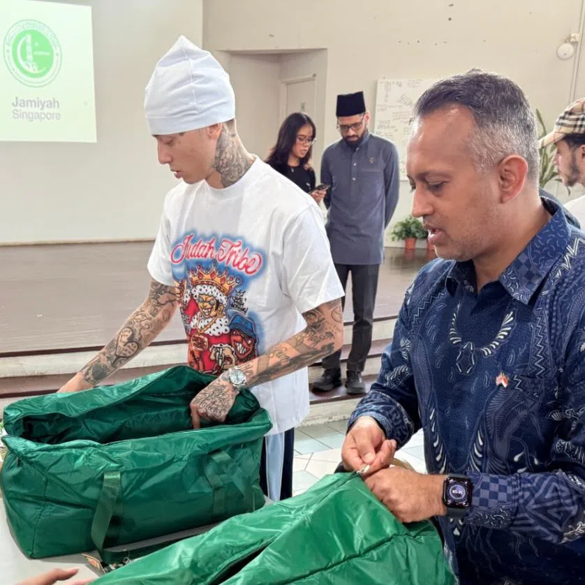 British rapper Central Cee (in white) with Mr Nik Mehta, the British High Commissioner to Singapore, at Jamiyah Home for the Aged (Darul Takrim) on March 18.