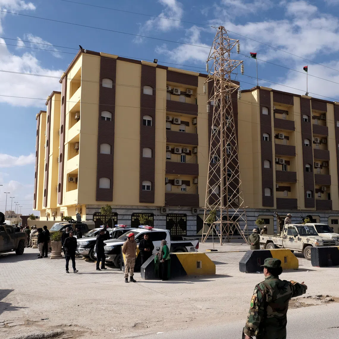 FILE PHOTO: Security forces stand guard outside the Parliament building, in Tobruk, Libya, February 10, 2022 REUTERS/Esam Omran Al-Fetori/File Photo