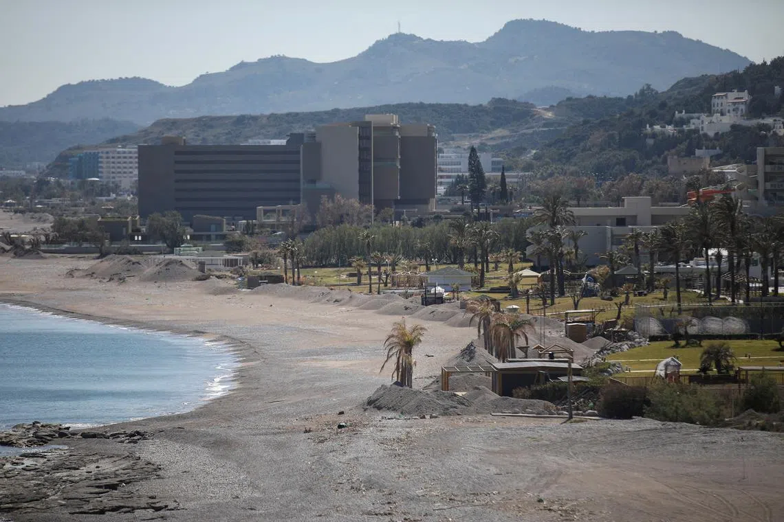 FILE PHOTO: View of the hotels on Ammoudes Beach, on the island of Rhodes, Greece, April 12, 2021. Picture taken April 12, 2021. REUTERS/Louiza Vradi/File Photo