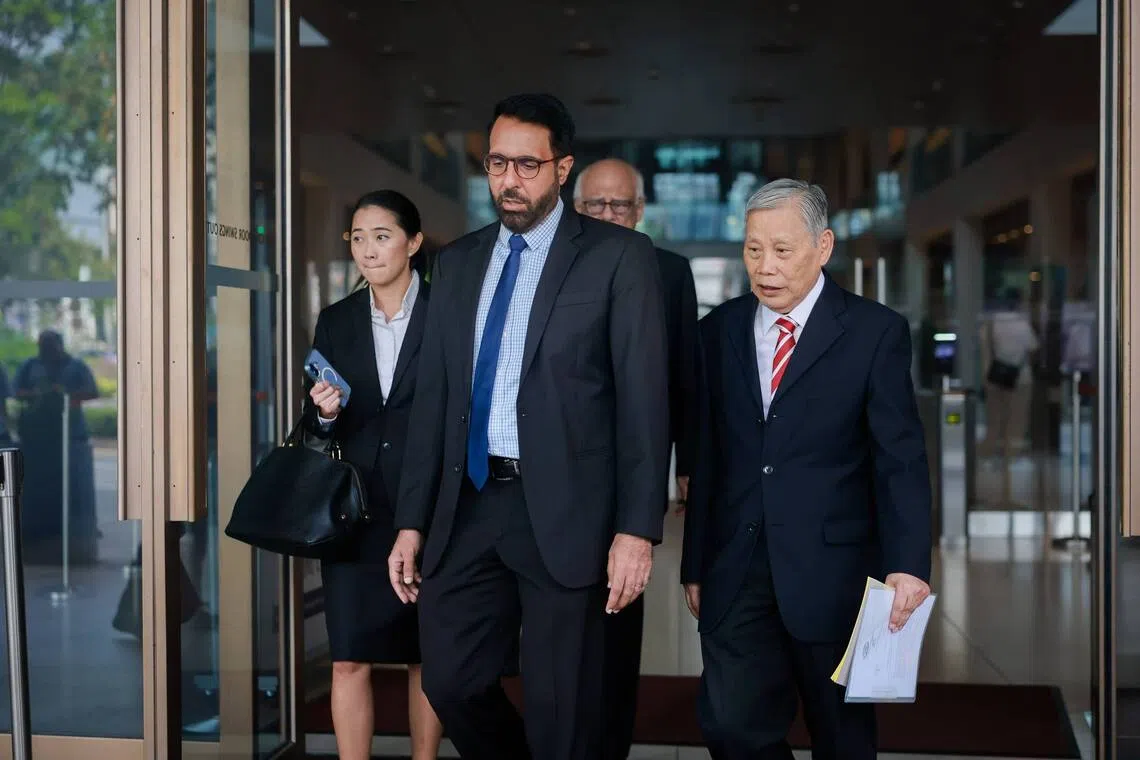 Workers’ Party chief Pritam Singh (centre) leaving the Supreme Court after the verdict on Aug 13.