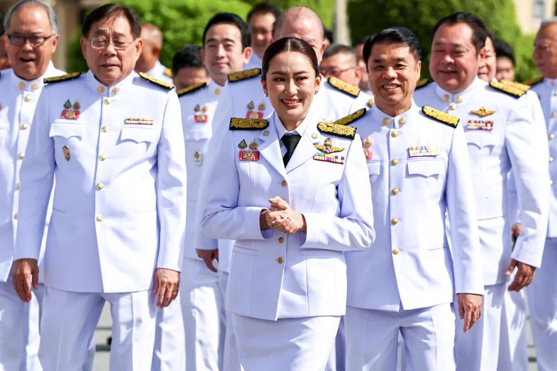 Thailand's Prime Minister Paetongtarn Shinawatra and her cabinet members arrive before a group photo session ahead of a special cabinet meeting at the Government house in Bangkok, Thailand, September 7, 2024. REUTERS/Athit Perawongmetha   REFILE - CORRECTING YEAR FROM "2023" TO "2024". 