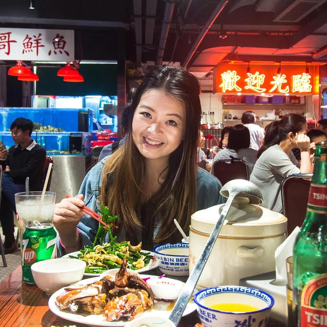 mfletter28 - Hong Kong foodie influencer Virginia Chan sampling dishes at a daipaidong (street food)-style restaurant in Mong Kok.PHOTO: COURTESY OF VIRGINIA CHAN