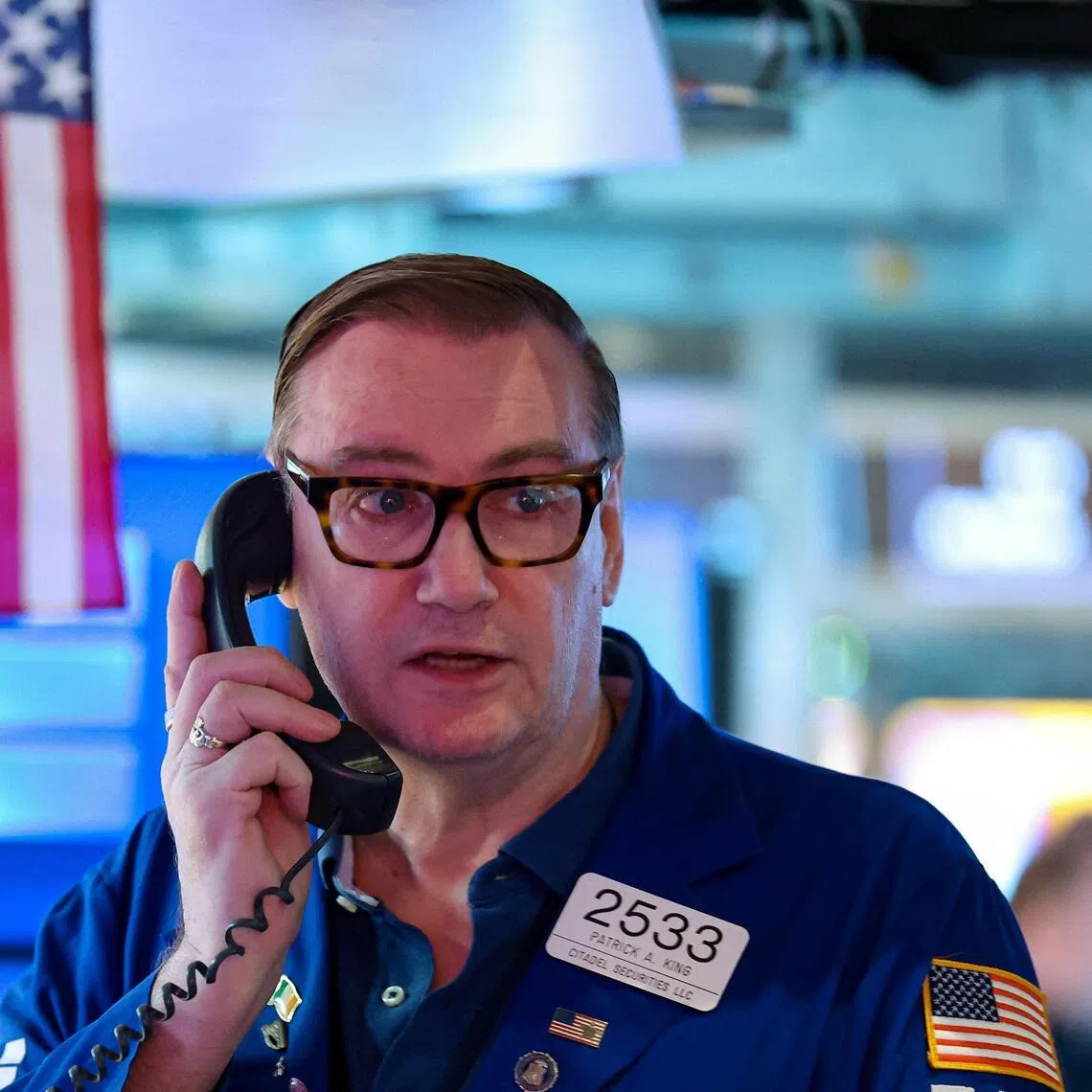 Traders working on the floor of the New York Stock Exchange in New York City, on July 14.