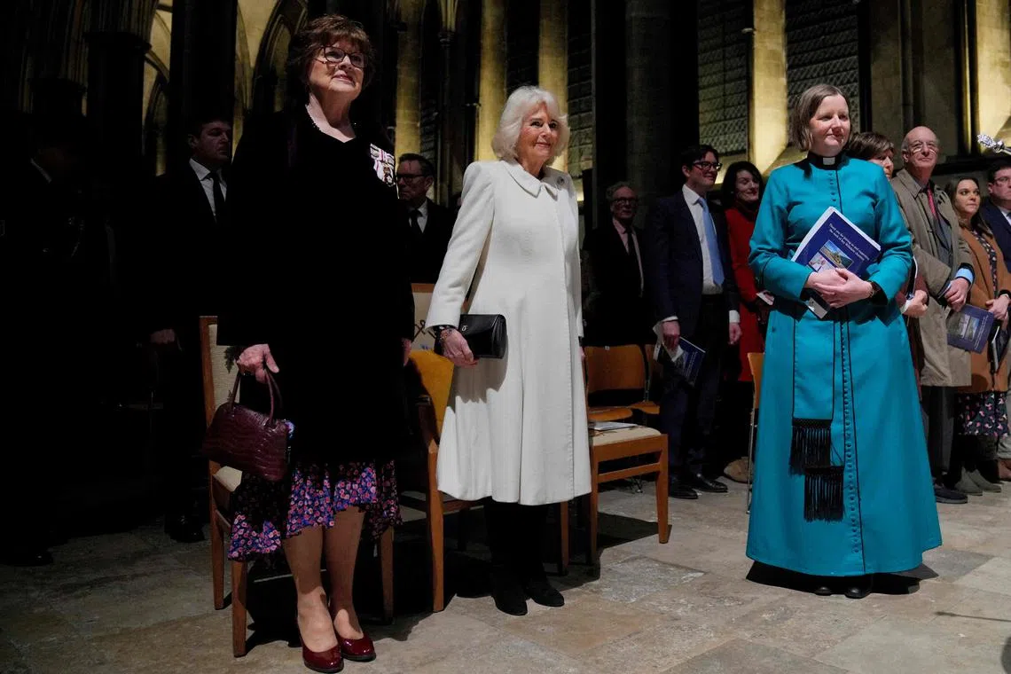 Britain's Queen Camilla (centre) attends a musical evening at Salisbury Cathedral, in Salisbury, England, on Feb 8, 2024, to celebrate the work of local charities. 