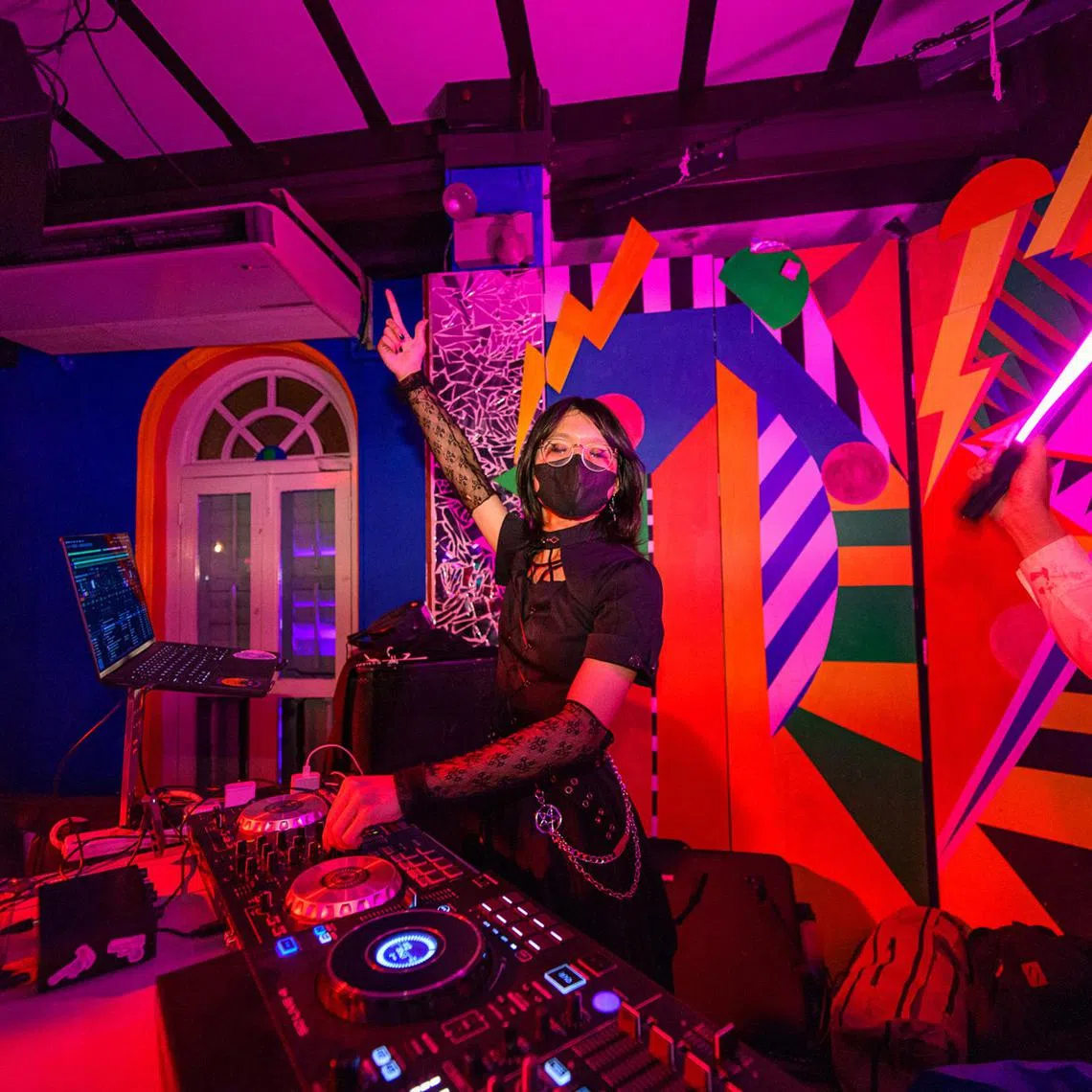 ffdja - Violet Yang, also known as DJ Vylt, spinning to dark alternative and horror genres.

PHOTO:  Brandon Koh