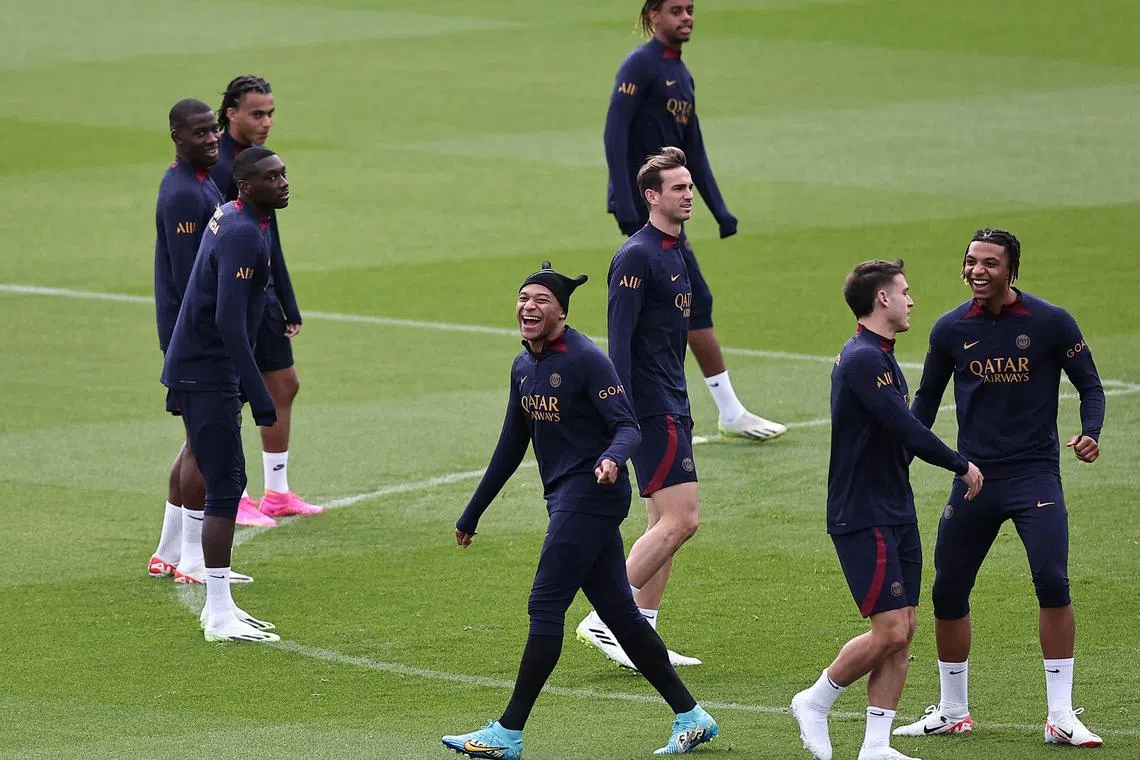 Kylian Mbappe with his Paris Saint-Germain teammates during a training session.