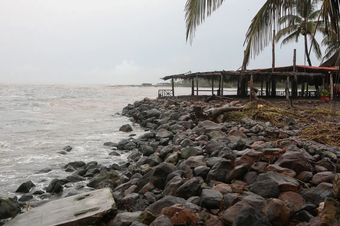 Clouds loom over a beach as Hurricane Trudy advances across the Pacific Ocean off Mexico's western coast, in Boca de Apiza, Michoacan state, Mexico, October 17, 2026. REUTERS/Gustavo Vilchis
