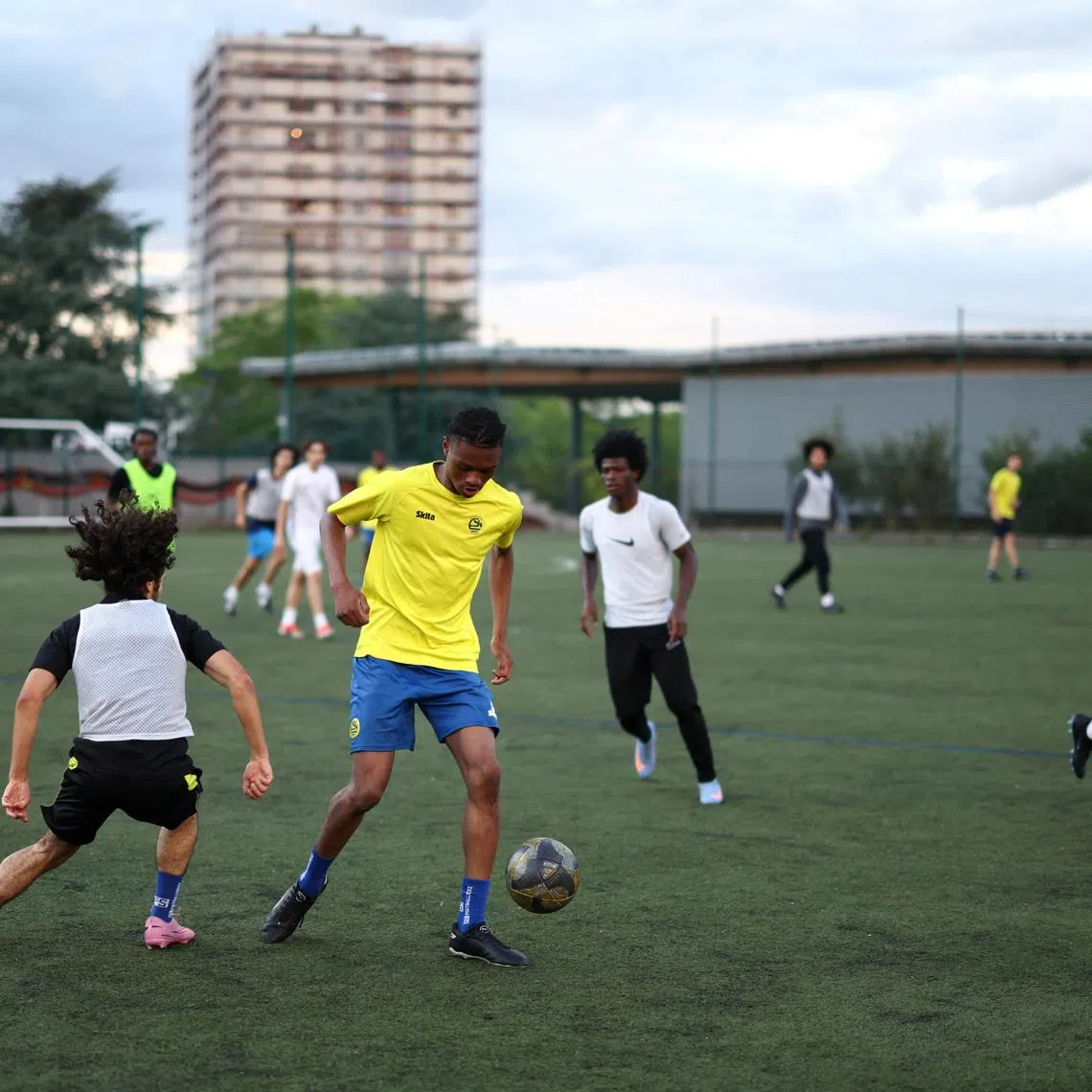 Young players train during an ES Nanterre Under-17s soccer training session at the Stade Gabriel Peri, in the Paris suburb of Nanterre, France, June 2, 2026. REUTERS/Tom Nicholson