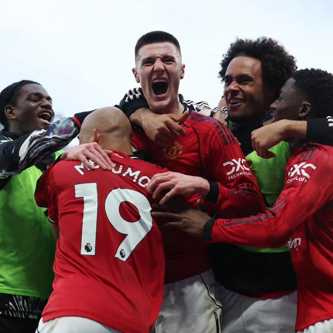 Manchester United striker Benjamin Sesko (centre) celebrates scoring an added-time winner in a 3-2 English Premier League home triumph against Fulham at Old Trafford on Feb 1, 2026.