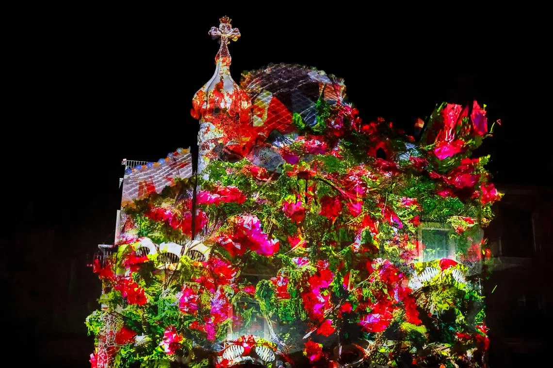Antoni Gaudi's Casa Batllo building in Barcelona is illuminated with digital video-mapping artwork in Barcelona, Spain, February 1, 2025. REUTERS/ Bruna Casas