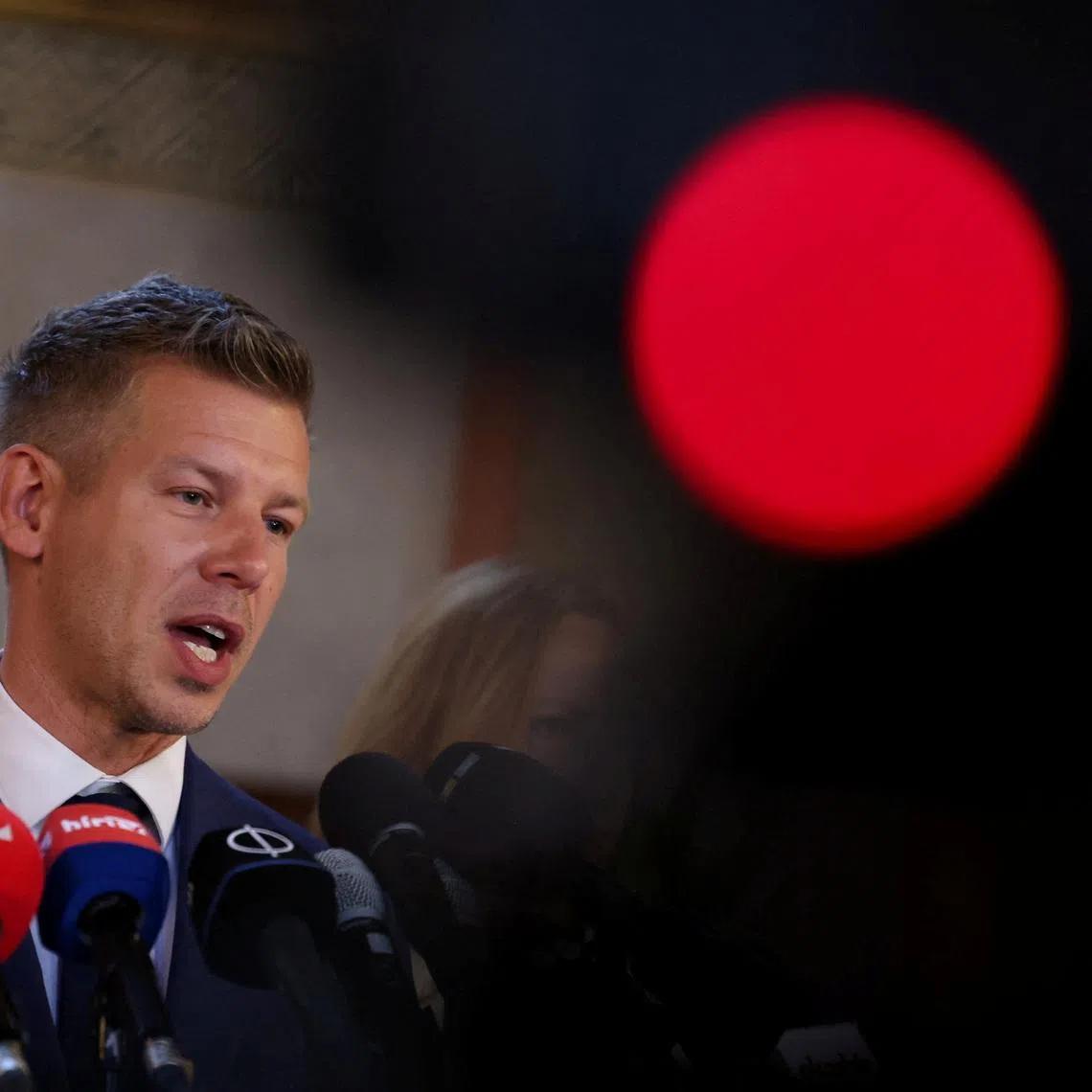 Hungary's election winner Peter Magyar talks to the media after talks between parties on preparations for the first session of the Parliament in Budapest, Hungary, April 17, 2026. REUTERS/Bernadett Szabo