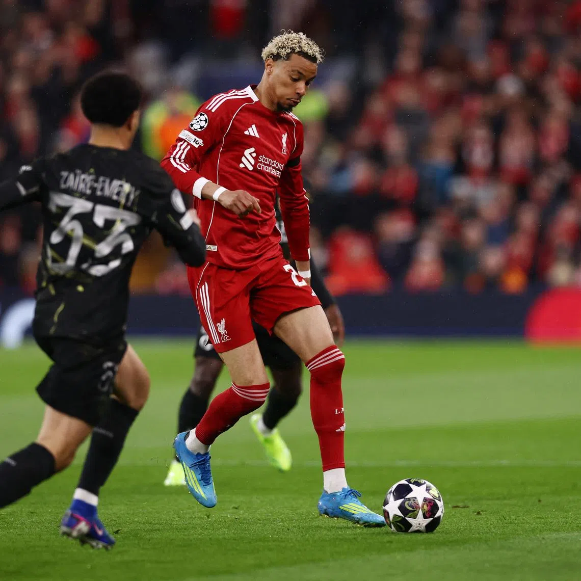 Soccer Football - UEFA Champions League - Quarter Final - Second Leg - Liverpool v Paris St Germain - Anfield, Liverpool, Britain - April 14, 2026 Liverpool's Hugo Ekitike in action with Paris St Germain's Warren Zaire-Emery Action Images via Reuters/Lee Smith