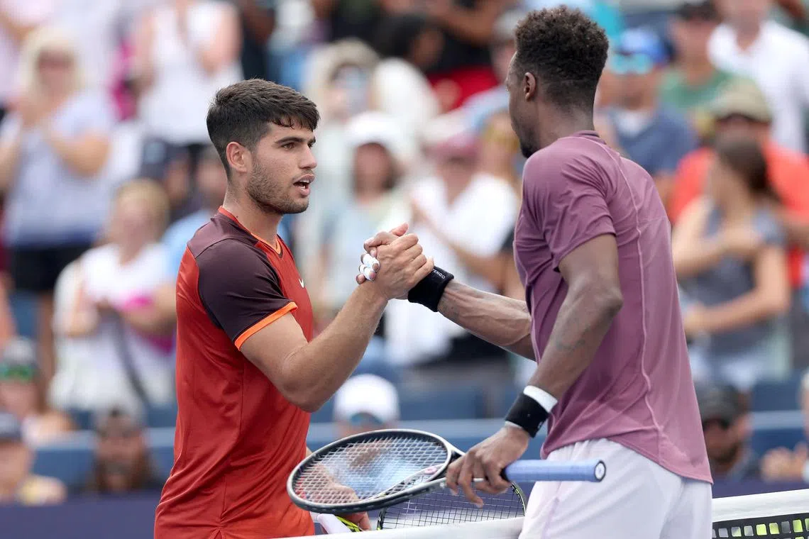 Spain's Carlos Alcaraz congratulates Gael Monfils of France after their match.