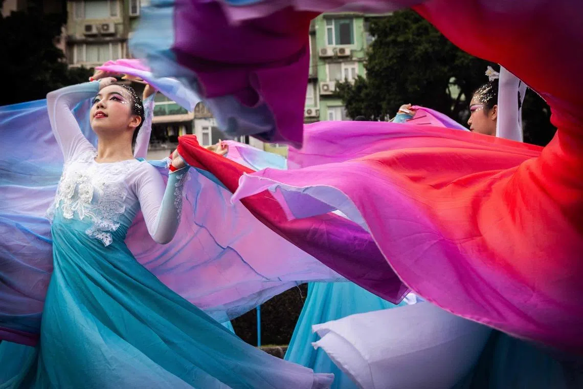 Chinese performer dancing during the Macau International Parade in Macau on March 29, 2026.