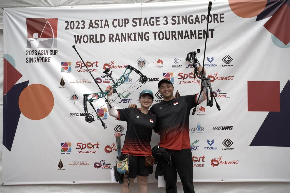 Singapore's mixed compound archer team Contessa Loh and Eer Jiang Ying posing at the Archery Asia Cup 2023 Stage 3 at Bukit Gombak Stadium.

PHOTO: ARCHERY ASSOCIATION OF SINGAPORE
