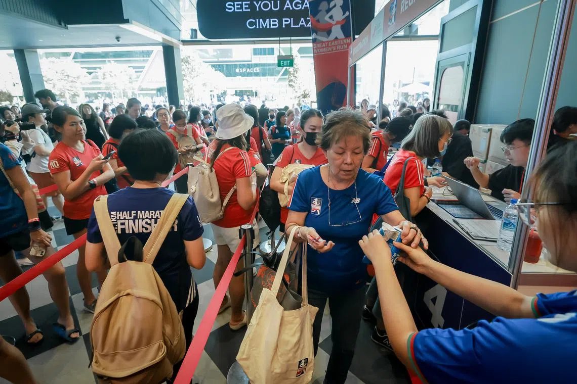 Members of the public at the launch of the 2023 Great Eastern Women's Run on May 24, 2023. The run will take place at the Singapore Sports Hub on Oct 29.