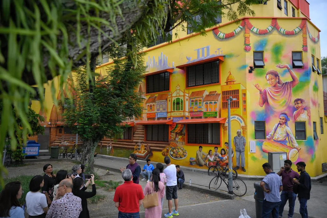 A wall mural documenting the history of the Arya Samaj Singapore, which is situated at the back of the building and was a part of a project supported by the NHB grant scheme.