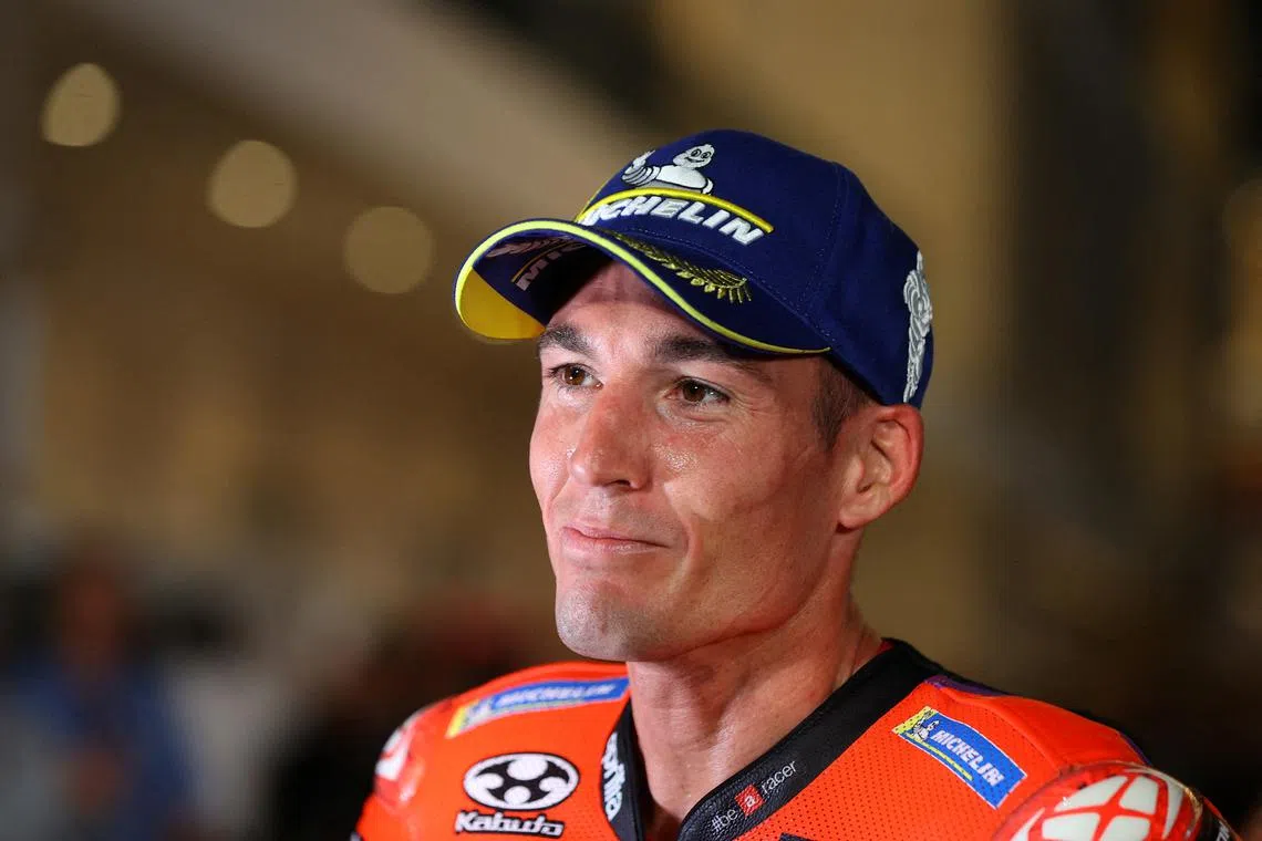 FILE PHOTO: MotoGP - Grand Prix of Qatar - Lusail International Circuit, Lusail, Qatar - March 9, 2024 Aprilia Racing's Aleix Espargaro celebrates after finishing third at the sprint race REUTERS/Ibraheem Al Omari/File Photo