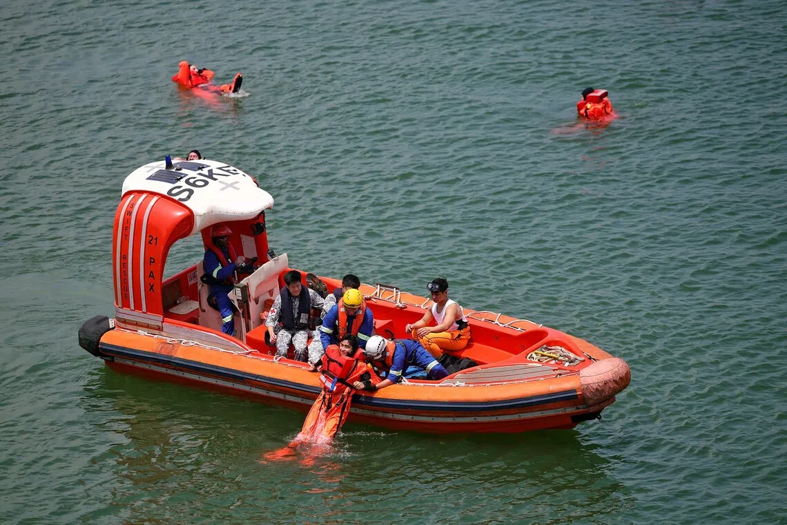 During the drill, about 10 personnel floated for roughly seven minutes before being picked up by a fast rescue craft.