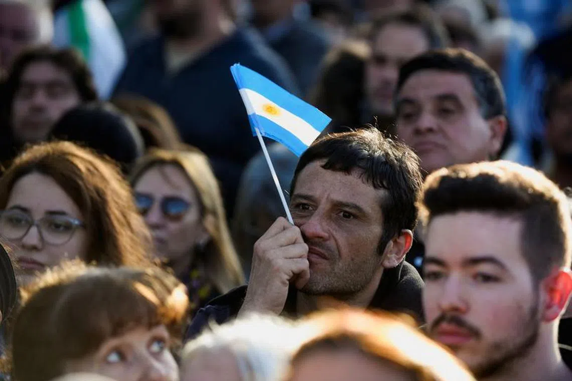 Supporters of Argentina's presidential candidate Patricia Bullrich of Juntos por el Cambio party attend the closing event of her electoral campaign ahead of the October 22 general election, in Buenos Aires, Argentina October 19, 2023. REUTERS/Martin Cossarini